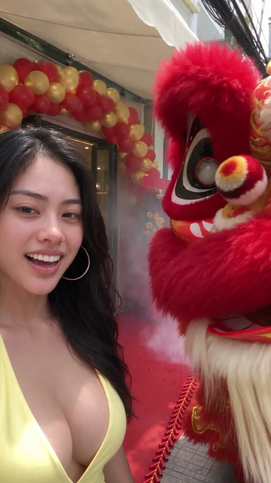 Melody laughing at a lion dance in Saigon